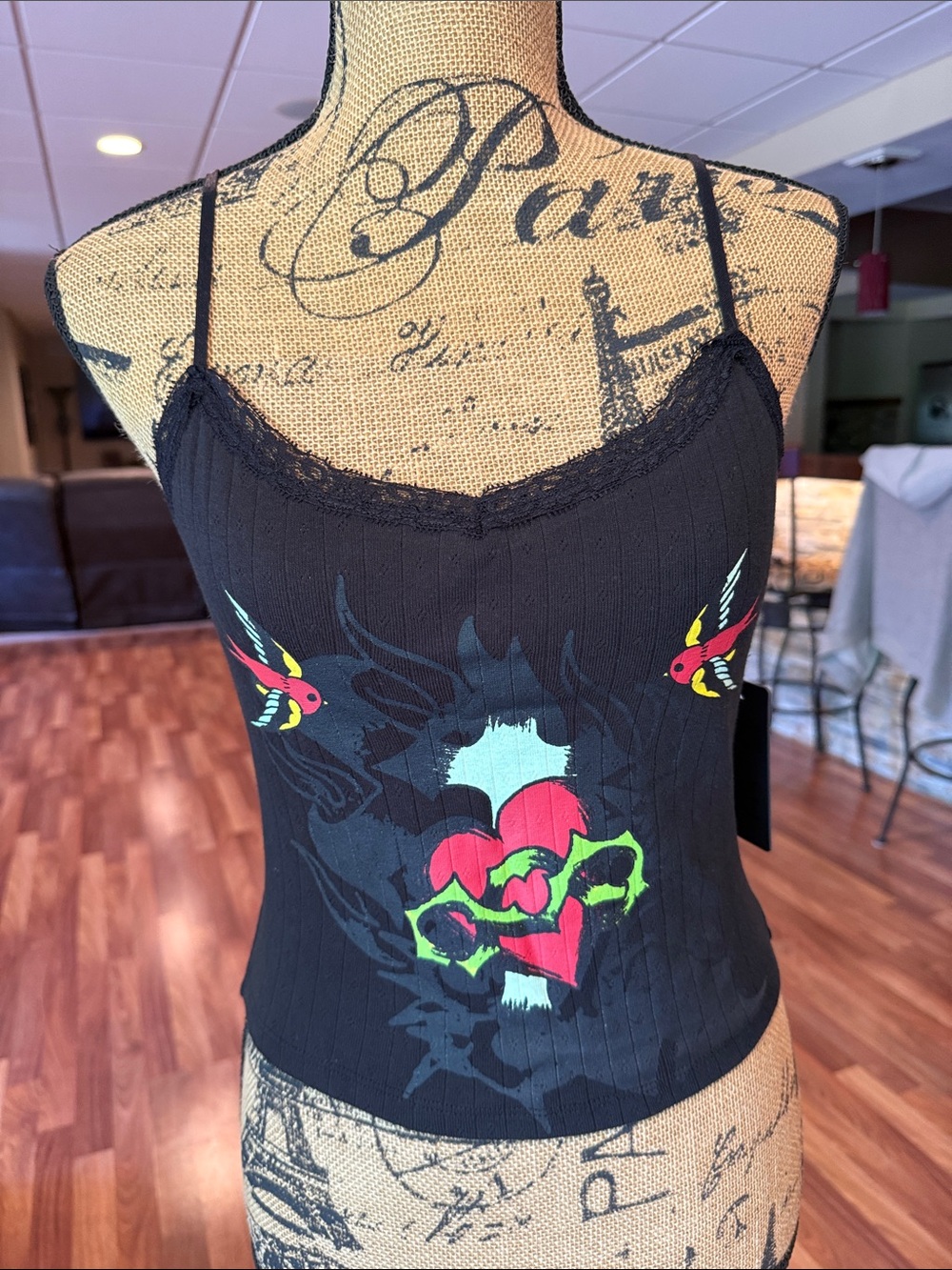 Ed Hardy size medium black tank with lace trim and “Ed Hardy” in gold